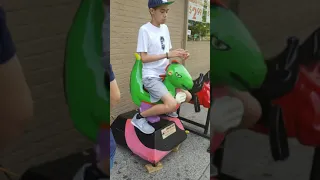 1990s Dinosaur kiddie ride (Slime green; Now it's gone)