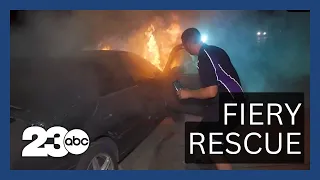 FedEx driver rescues man from burning car