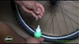 How To Install Slime in your Bike Tires 14