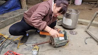 The girl repairs and renews the bran grinding machine.