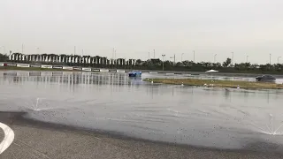 BMW M4 Competition drifting in the rain at the BMW driving academy Incheon.