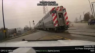 Harrowing Video Shows Cop Narrowly Avoiding Getting Hit by Train