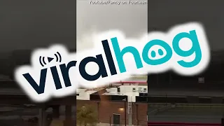 Guy Watches a Tornado Dissipate From Hotel Room || ViralHog