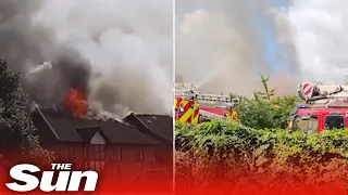 Huge explosion rocks block of flats as blaze engulfs building in Bedford