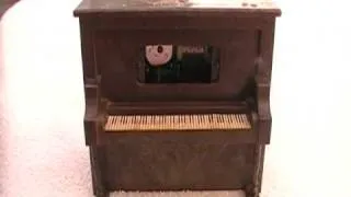 Piano music box that plays love story theme