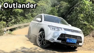 The Outlander challenged the climb, stepped back with the gas pedal, and nearly rolled over