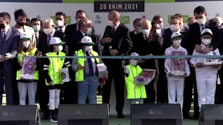 Girl cuts ceremony ribbon before Turkey's leader is able to