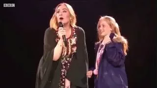 Adele brings young fan up on stage at Glastonbury and it's the cutest thing!