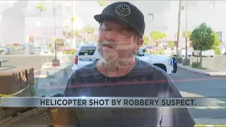 Officer Helicopter shot at by suspect after robbery