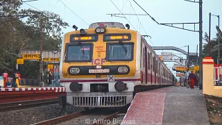 Shiny colorful crowded EMU local trains are arriving & departing Balagarh