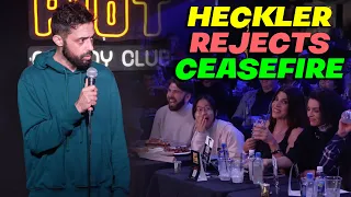 Heckler Rejects CEASEFIRE