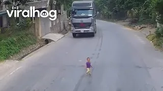 Baby Runs onto Road || ViralHog