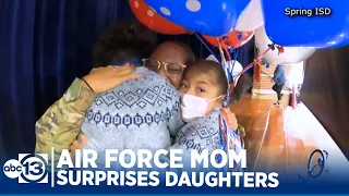 Air Force mom surprises daughters after 6-month deployment