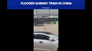 Commuters stuck in flooded subway in China