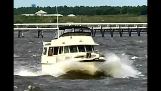 Leaving the dock in a large Hatteras Yacht