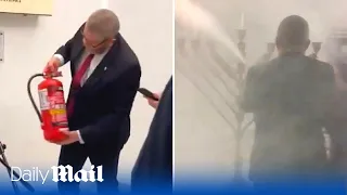 Polish far-right leader uses fire extinguisher to put out Hannukah candles in Parliament