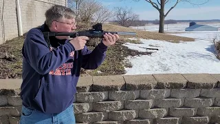 ruger charger with xrt tactical suppresser.