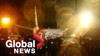 At least 15 dead after Air India Express plane crash lands in Calicut