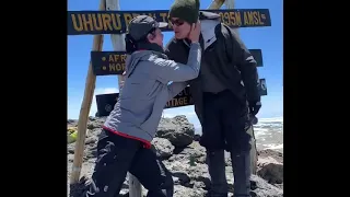Getting engaged at the summit of Mt. Kilimanjaro