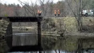 Pan Am rail crew replacing a rail in maine