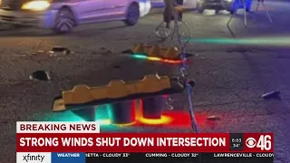 Tropical storm force winds take out traffic signal in Gwinnett