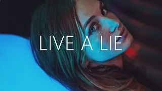 Rival x Egzod - Live A Lie (Lyrics) ft. Andreas Stone