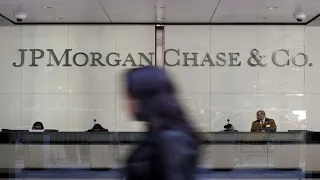 JPMorgan Suspends Buybacks as Earnings Miss Estimates