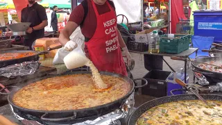 Cooking Six Large Spanish Paella. Seafood, Chicken, Chorizo and More. London Street Food