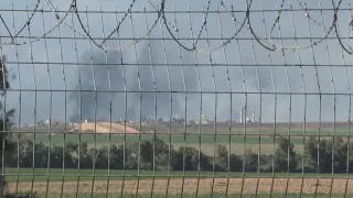 Plumes of smoke seen from Israel’s side of the border with Gaza as fighting on 101st day