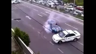 Police chase ends with guy DRIFTING around the cop cars. CRAZY AND HILARIOUS!!