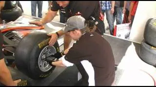 Changing a wheel on a McLaren F1 car