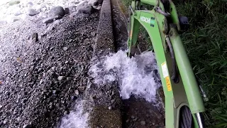 Clean the waterway a second time with an excavator. A clear river in Japan.