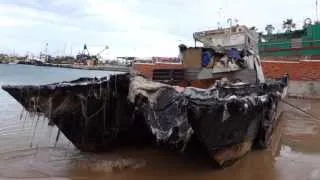Boat aground in Kalk Bay harbour, Cape Town