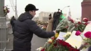 Supporters continue to bring flowers to shrine