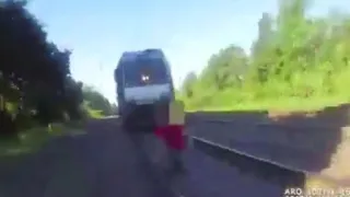 Video: Cop shouts, saves man from oncoming train