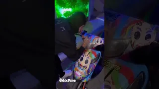 6ix9ine signs a fan custom Tattletales logo album theme bike