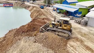 Great showing Excellent skill Dozer & Dump truck Dumping soil into water to Resize Road on canal