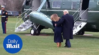 President Trump catches First Lady Melania as she stumbles - Daily Mail