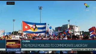 ¨Cuba lives and works¨ the main slogan of this day
