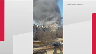 Crews working to extinguish large fire at DeKalb County apartment complex
