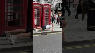 Man Doing Press Up in the Middle of Central London Street