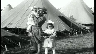 Women greet returning US soldiers at Army base in World War I HD Stock Footage