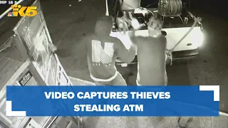 Surveillance video captures thieves ramming stolen truck into store, ripping away ATM