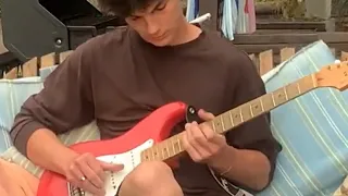 Playing Sultans Of Swing Final Solo on a Swing