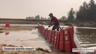 Noaq Boxwall Flood Barrier Demonstration on Poor Surface with Plastic Sheeting