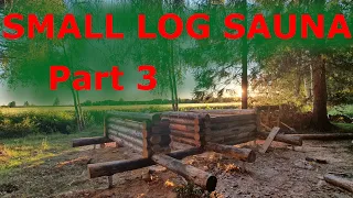 Build a small log cabin/sauna part 3. Insulating and fastening logs.