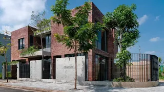 Inside a beautiful small brick house in Vietnam, designed by Hinz Studio