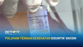 Puluhan Tenaga Kesehatan Disuntik Vaksin