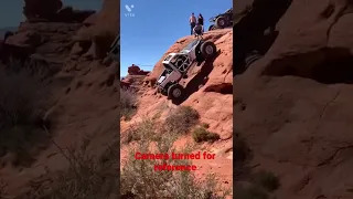 Crawler climbing vertical wall at Sand hollow state park Hurricane Utah