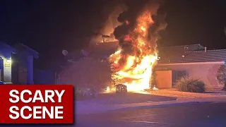 Hybrid car catches fire in Arizona home's garage
